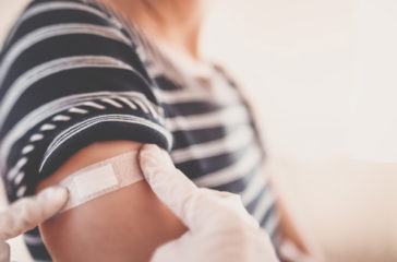 Woman and a doctor in the hospital after vaccination against Covid 19.