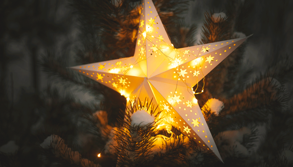 merry-christmas-christmas-star-glowing-snowy-tree-night-close-up-atmospheric-magic-winter