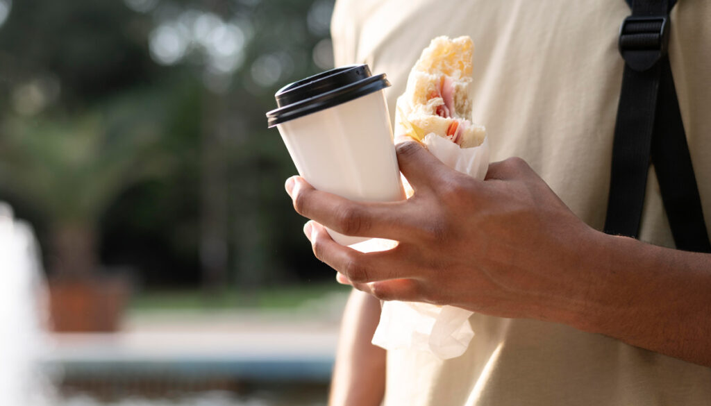 man-enjoying-some-takeaway-food